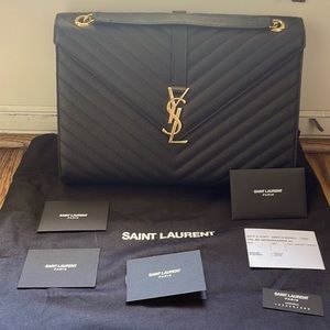 YSL large Black caviar leather envelope convertible handbag, shoulder& Crossbody